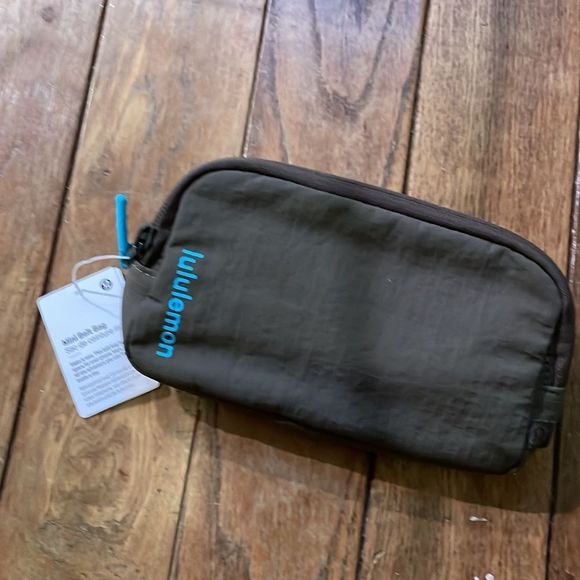 lululemon athletica Handbags - Lululemon Mini Belt bag everywhere NWT fanny pack waist saddle Army green blue